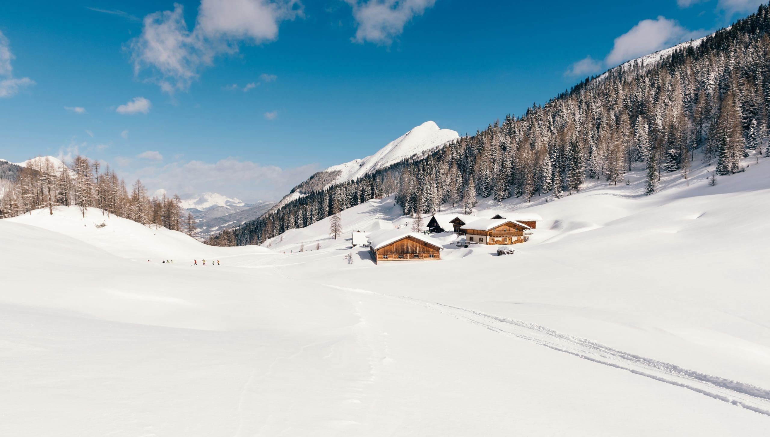 Landscape view of the high-alpine Zauchensee ski resort bowl in winter